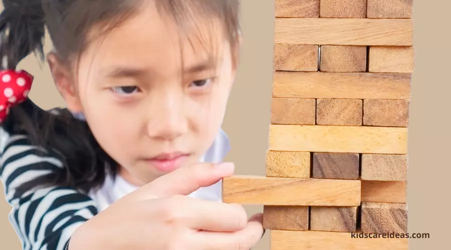 kids playing jenga