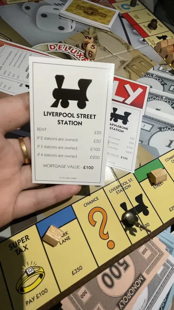Image of Liverpool Street Station and its Deed in Monopoly