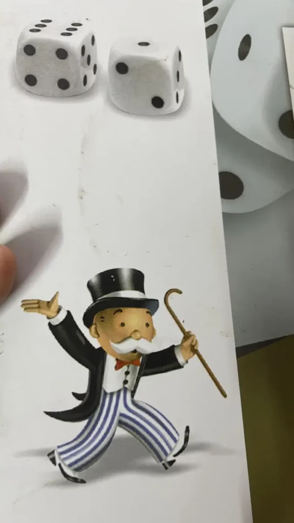 Monopoly Man does not have monocle from Monopoly Deluxe Edition Box