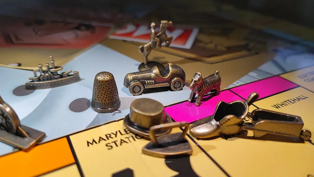 Different Monopoly tokens, Each Representing a player