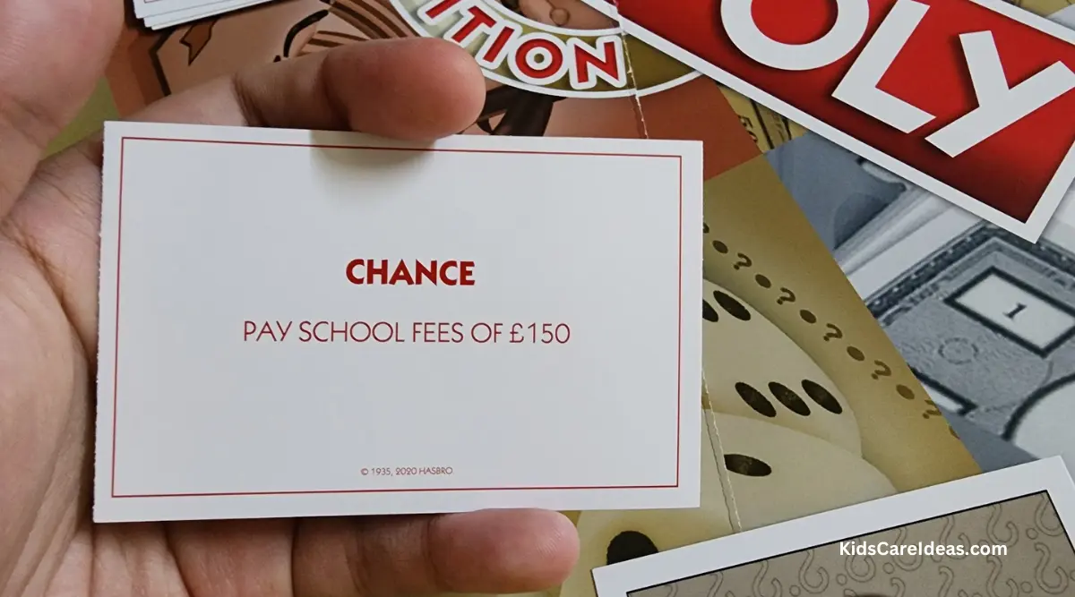 Image of Chance card which reads "Pay School Fees of £150"