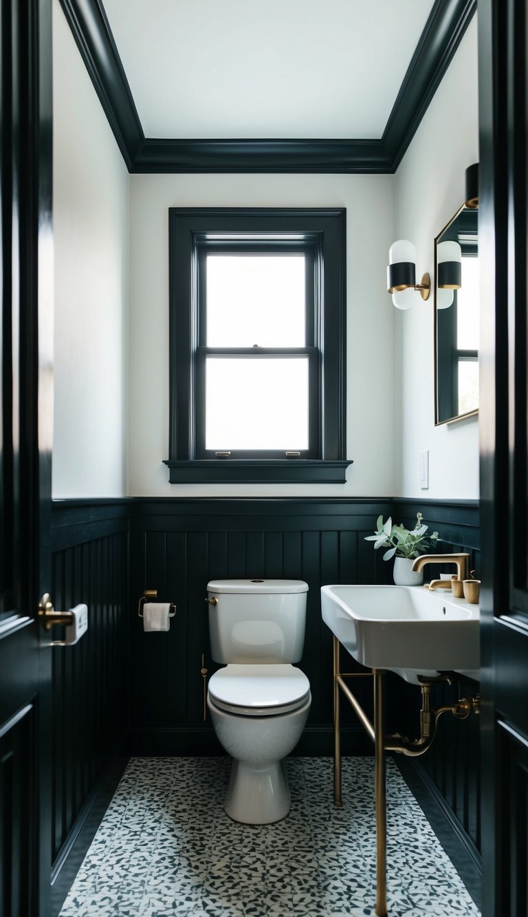 A small black bathroom with shadow trim, minimal decor, and modern fixtures